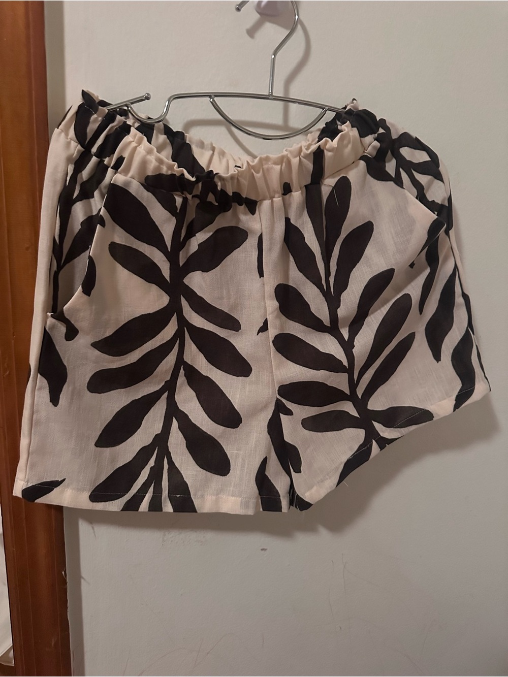 Primark High Waist Black Leaf Print Shorts on Cream